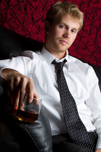 Man drinking scotch